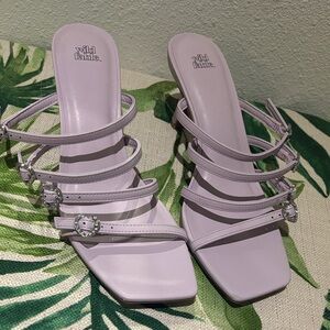 Lavender strappy heels! Brand new, never worn! Heart shaped buckles